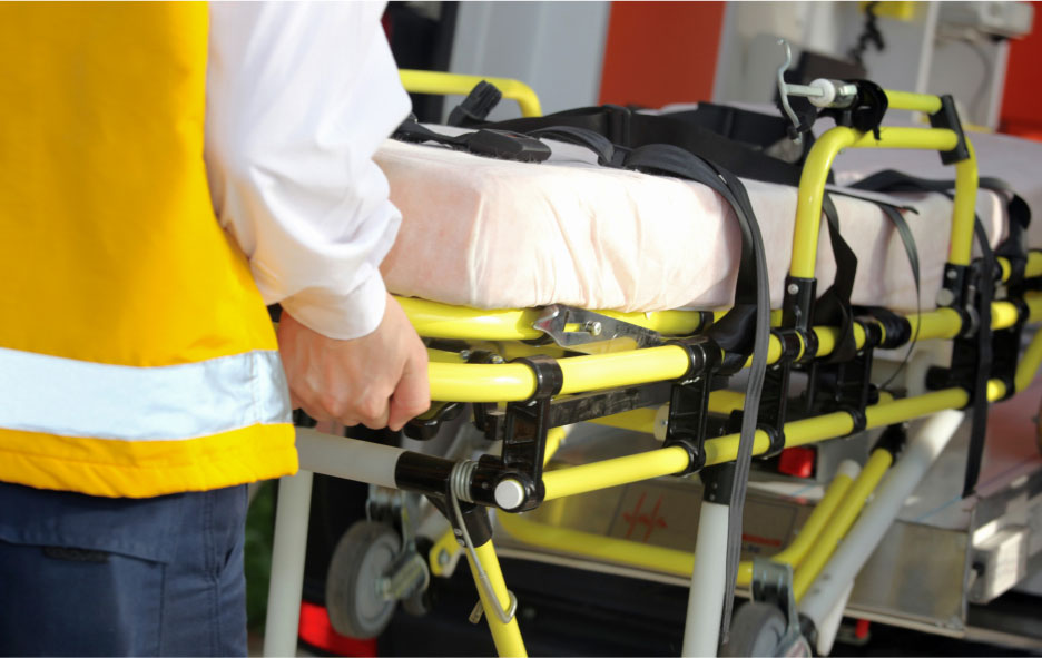 Zoomed In Showing Man Holding Stretcher Handle