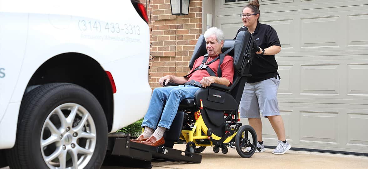 Passenger in the Traversa being wheeled into a van