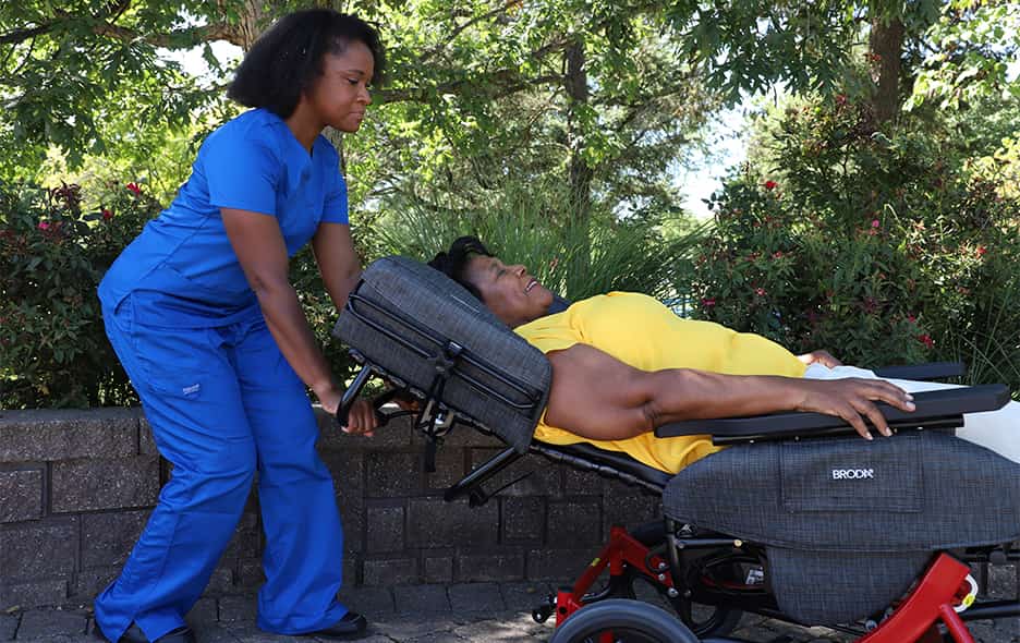 Passenger laying flat in a Broda chair