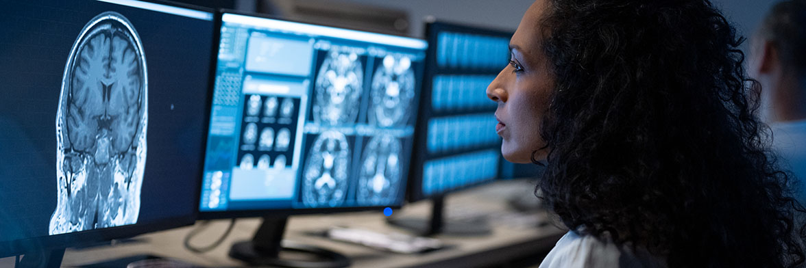 Close-up of a radiologist analyzing an MRI scan