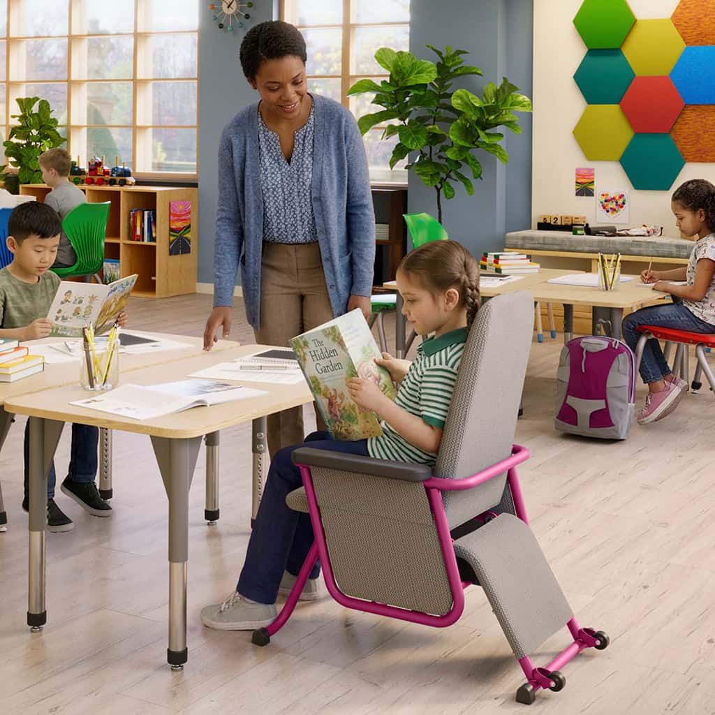 Child in an Aspire glider in a classroom setting