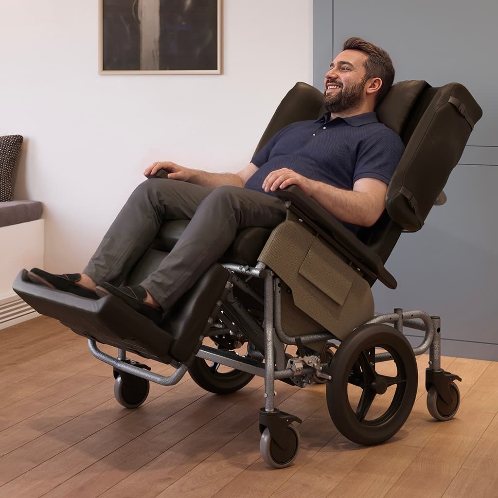 Middle-aged man in an Elite Rehab wheelchair