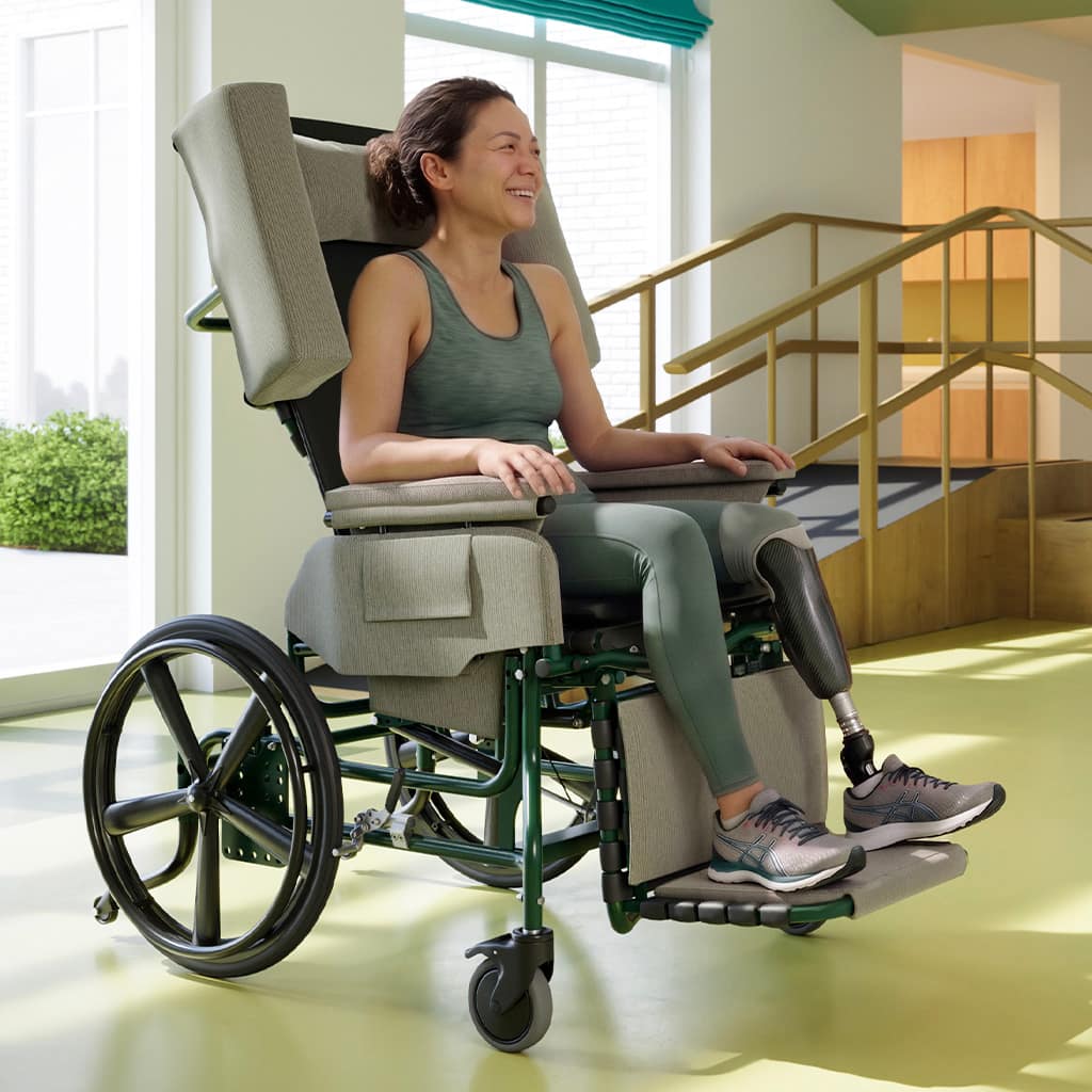 Woman in an Elite Rehab wheelchair in an entrance area