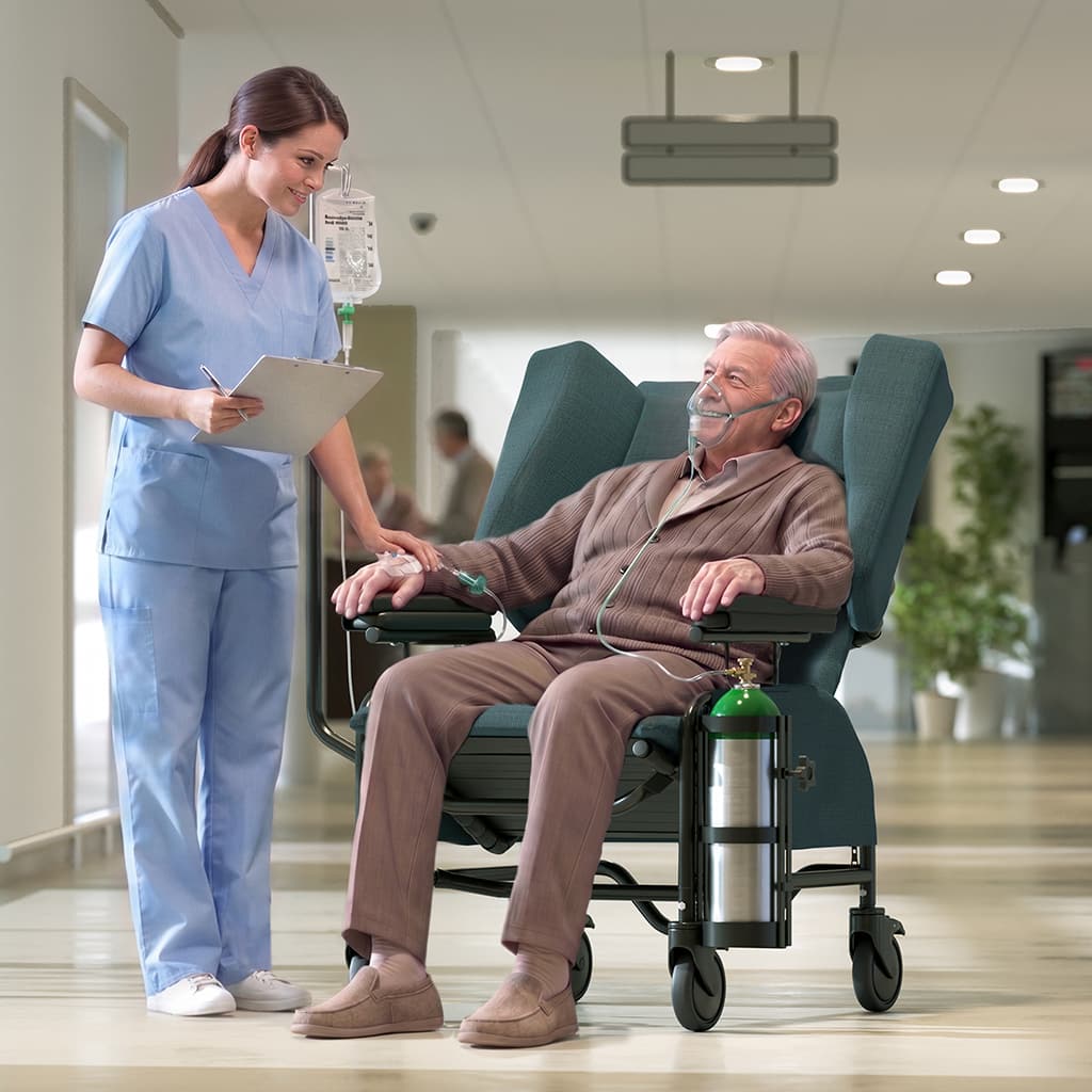 Senior man in a Sashay Pedal with a caregiver at his side