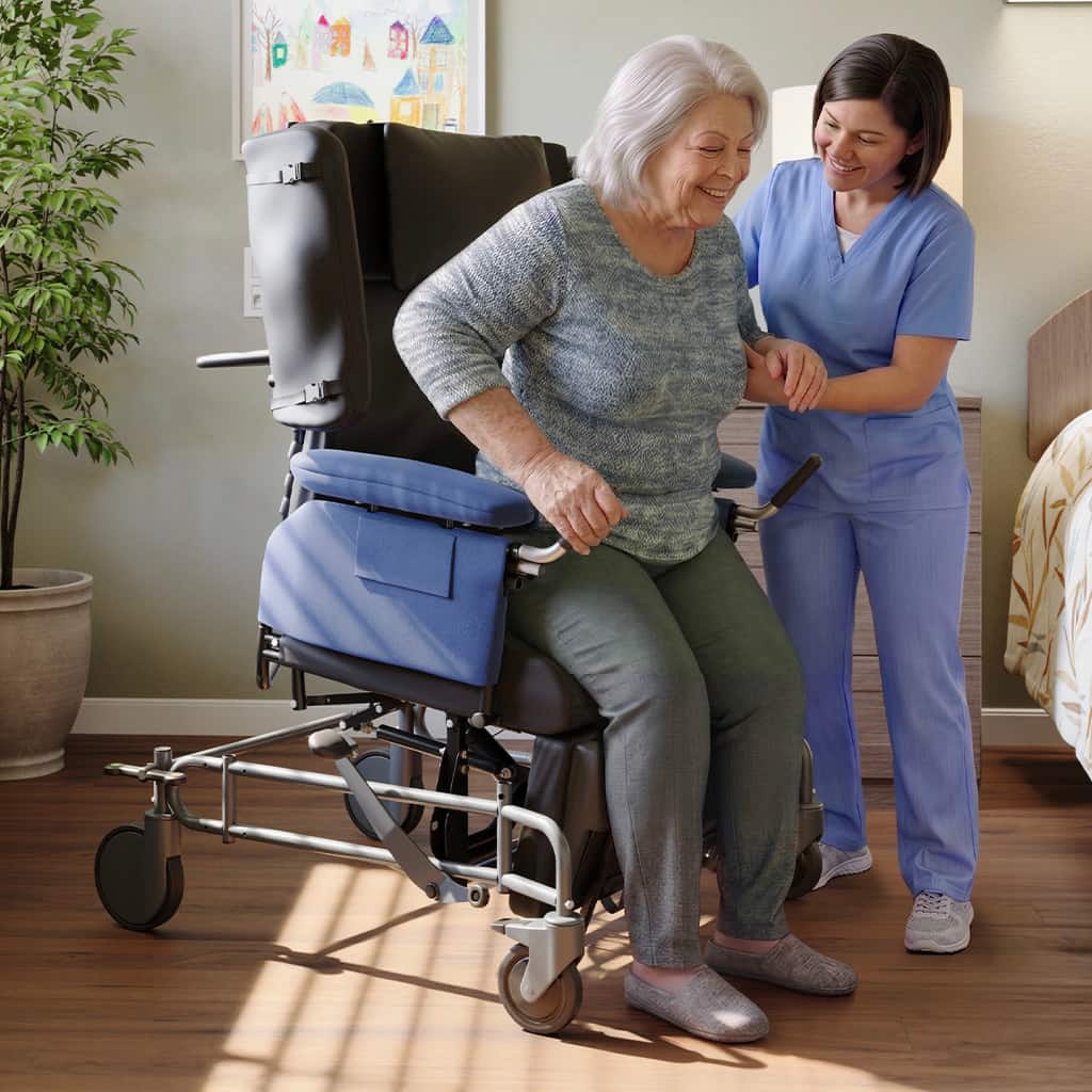Caregiver helping a woman into a Vanguard wheelchair